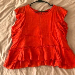 Bright coral red shirt from Anthropologie
